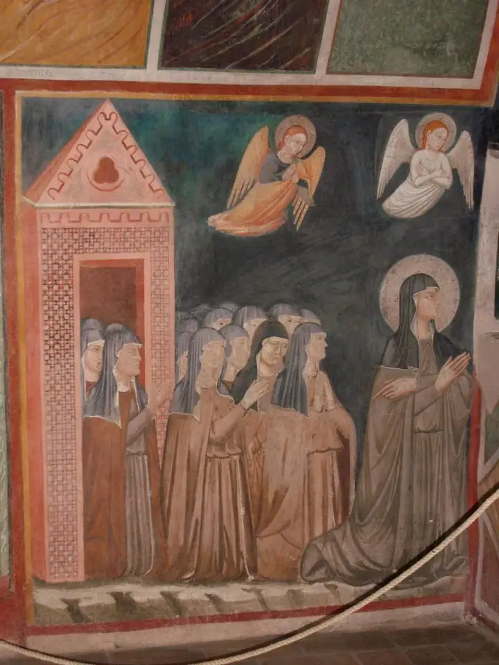 Santa Chiara in preghiera con le Clarisse a san Damiano Santa Chiara in preghiera con le Clarisse a san Damiano